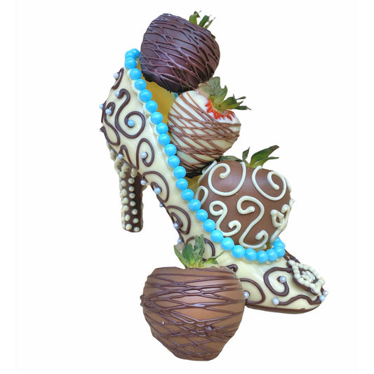 Chocolate shoe with chocolate covered strawberries